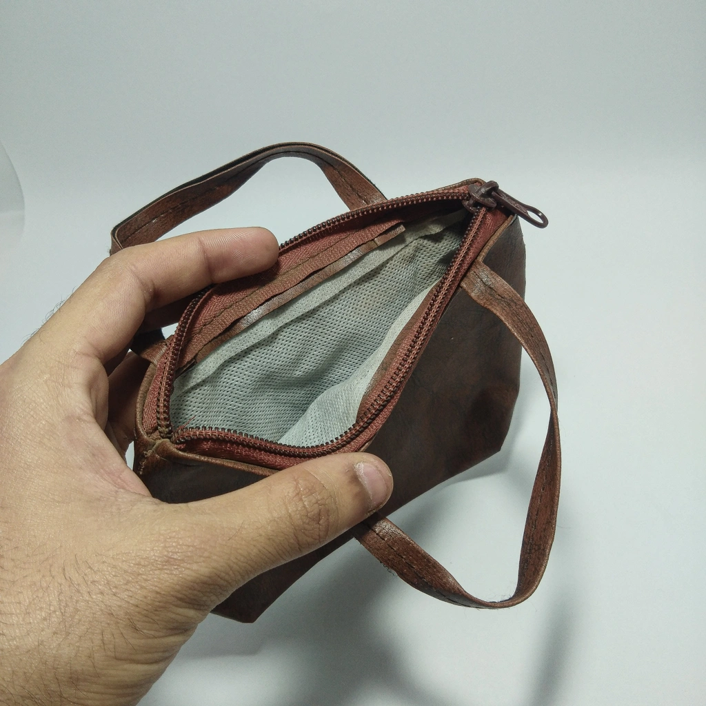 brown leather bag thela