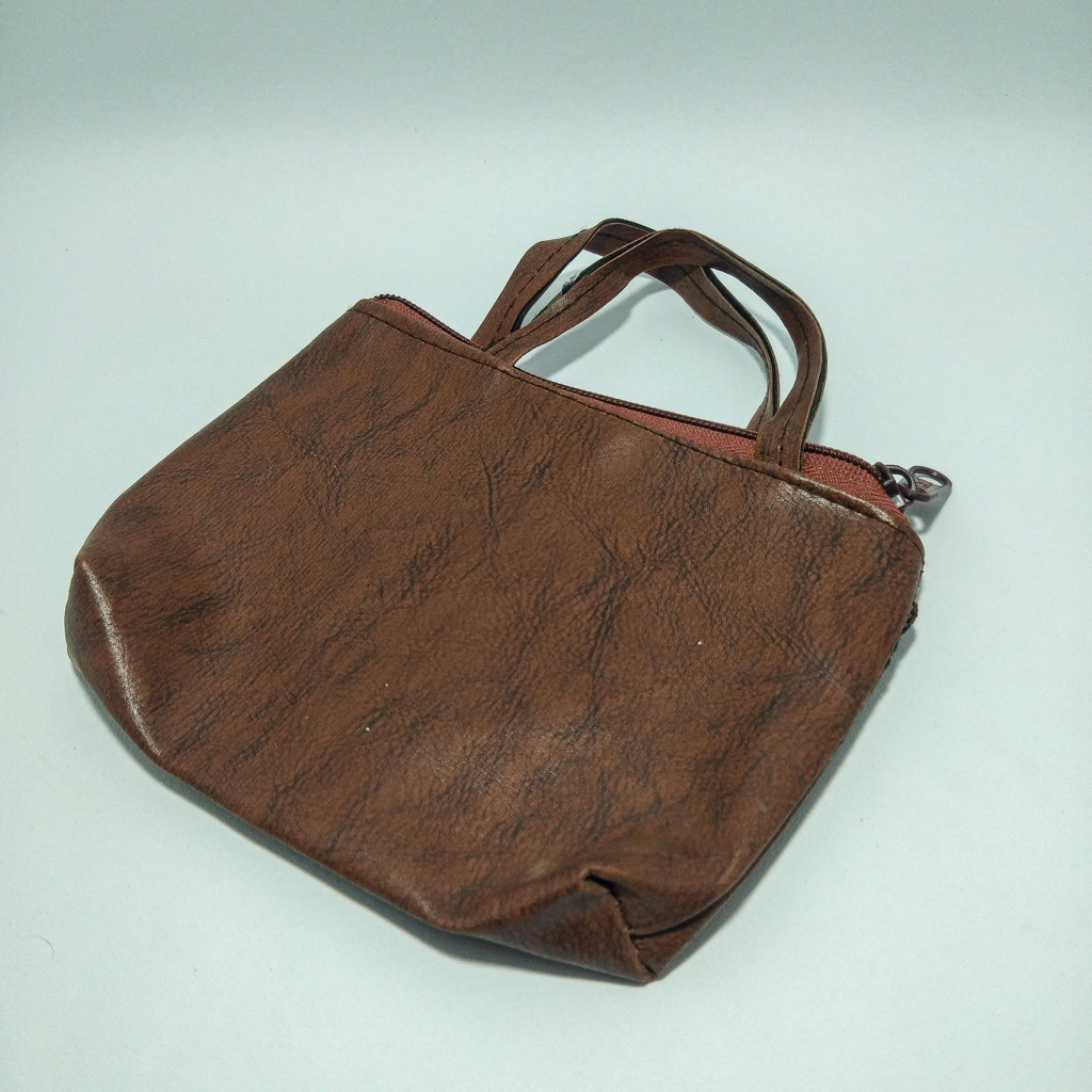 brown leather bag thela box 