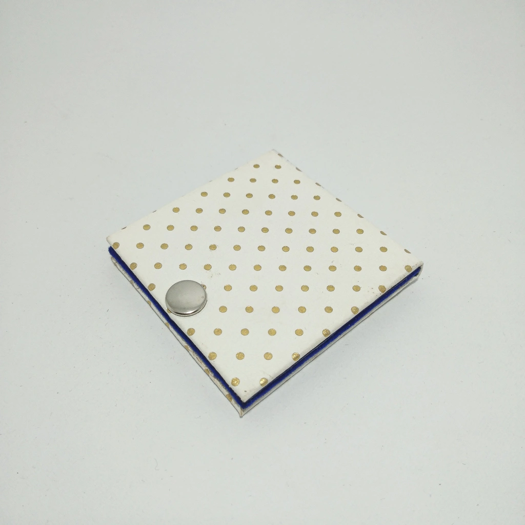 white bindi button coin folder box 