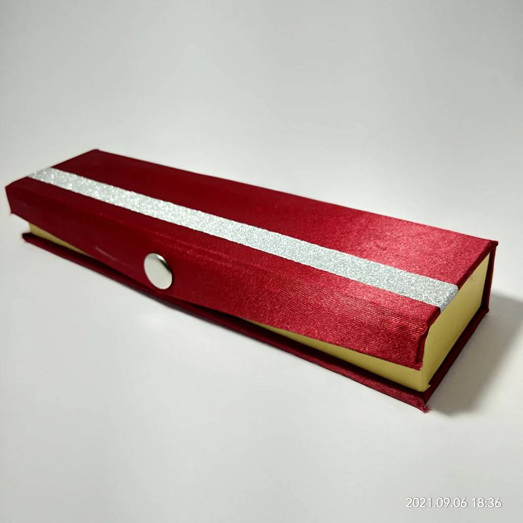 maroon satin strip white tika box 